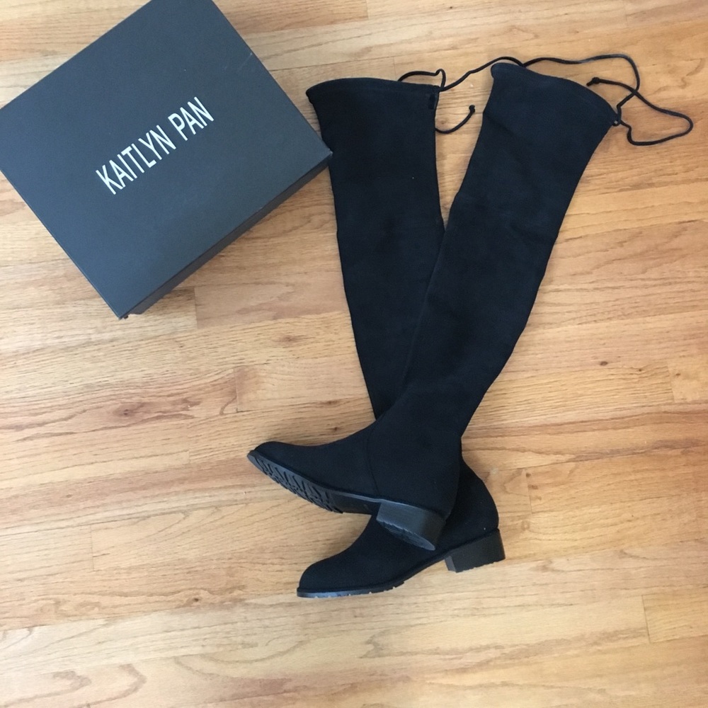 Kaitlyn Pan over the knee boots on hold
